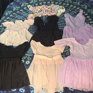 Assorted Ballet Dresses in Black, Pink, and Purple